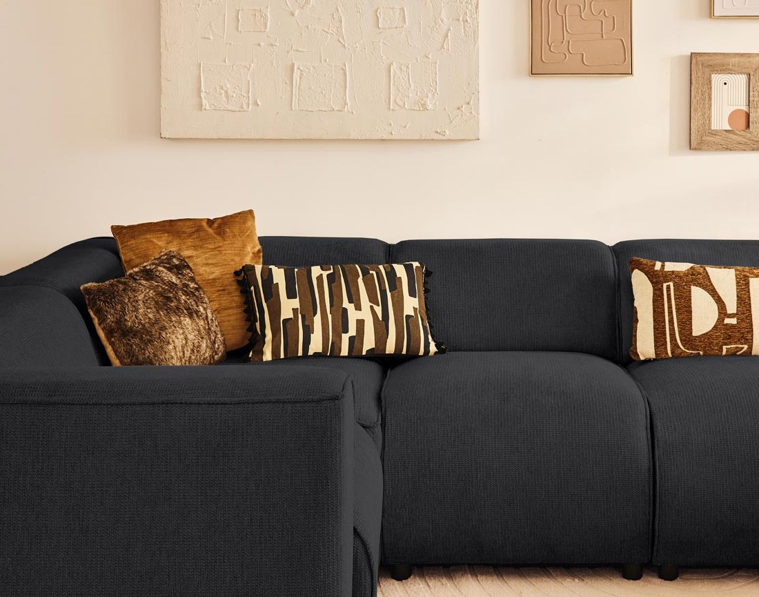 Canapé modulable panoramique d'angle gauche 7 places en tissu texturé Suaro