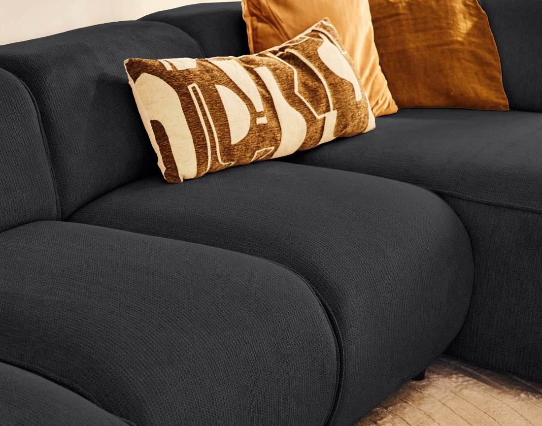 Canapé modulable panoramique d'angle gauche 7 places en tissu texturé Suaro