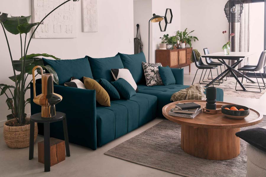 Comment décorer son salon avec votre canapé bleu canard ?